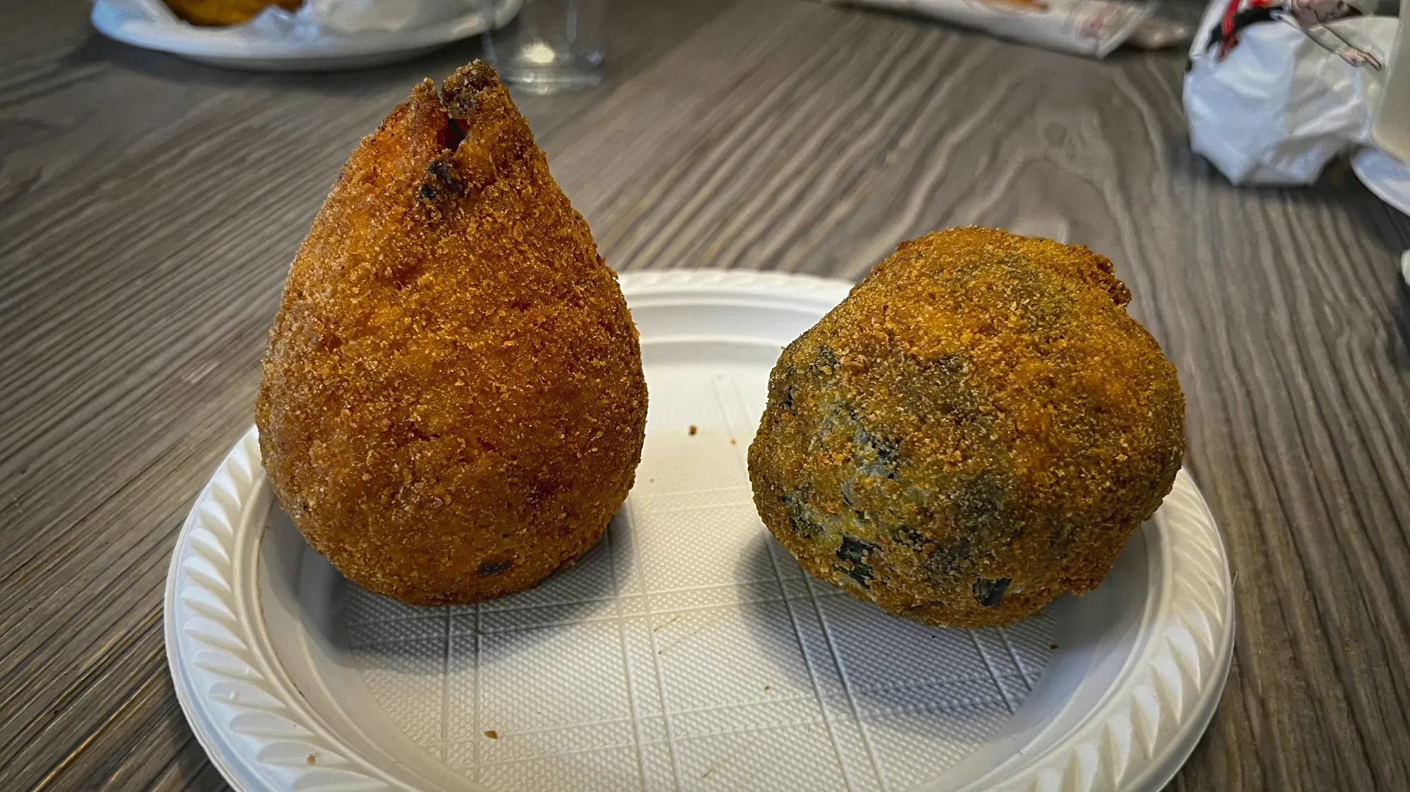 Arancini. Low angle shot on a plate.