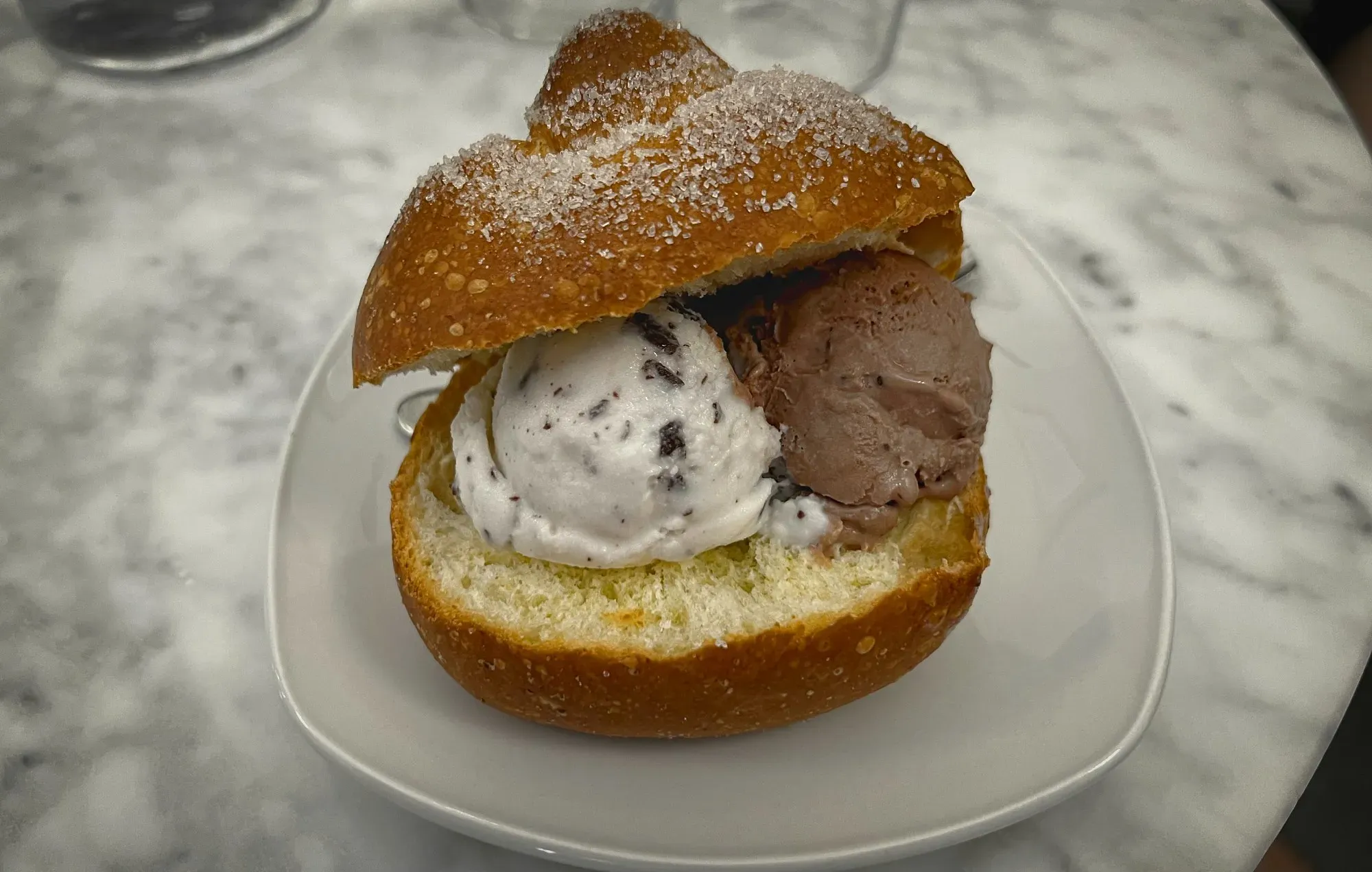 Brioche con Gelato from Cafe Sicilia in Noto. Low angle shot.