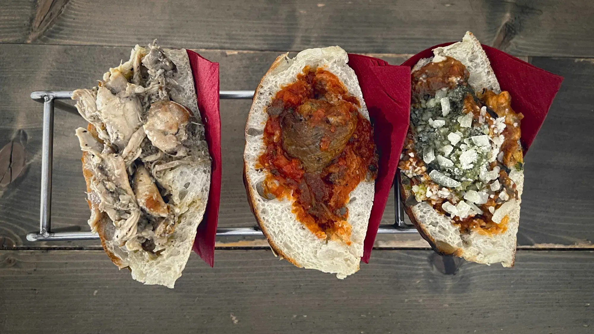 Overhead shot of Trapizzino on a wooden table.