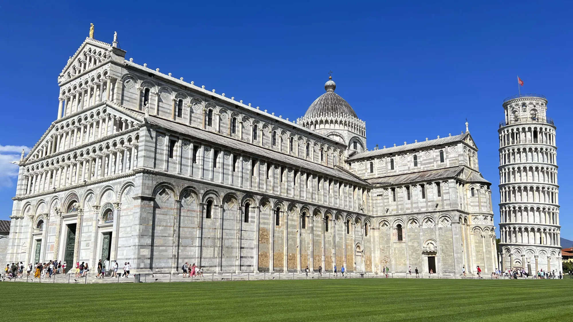 Baptistry and leaning tower of Pisa together.