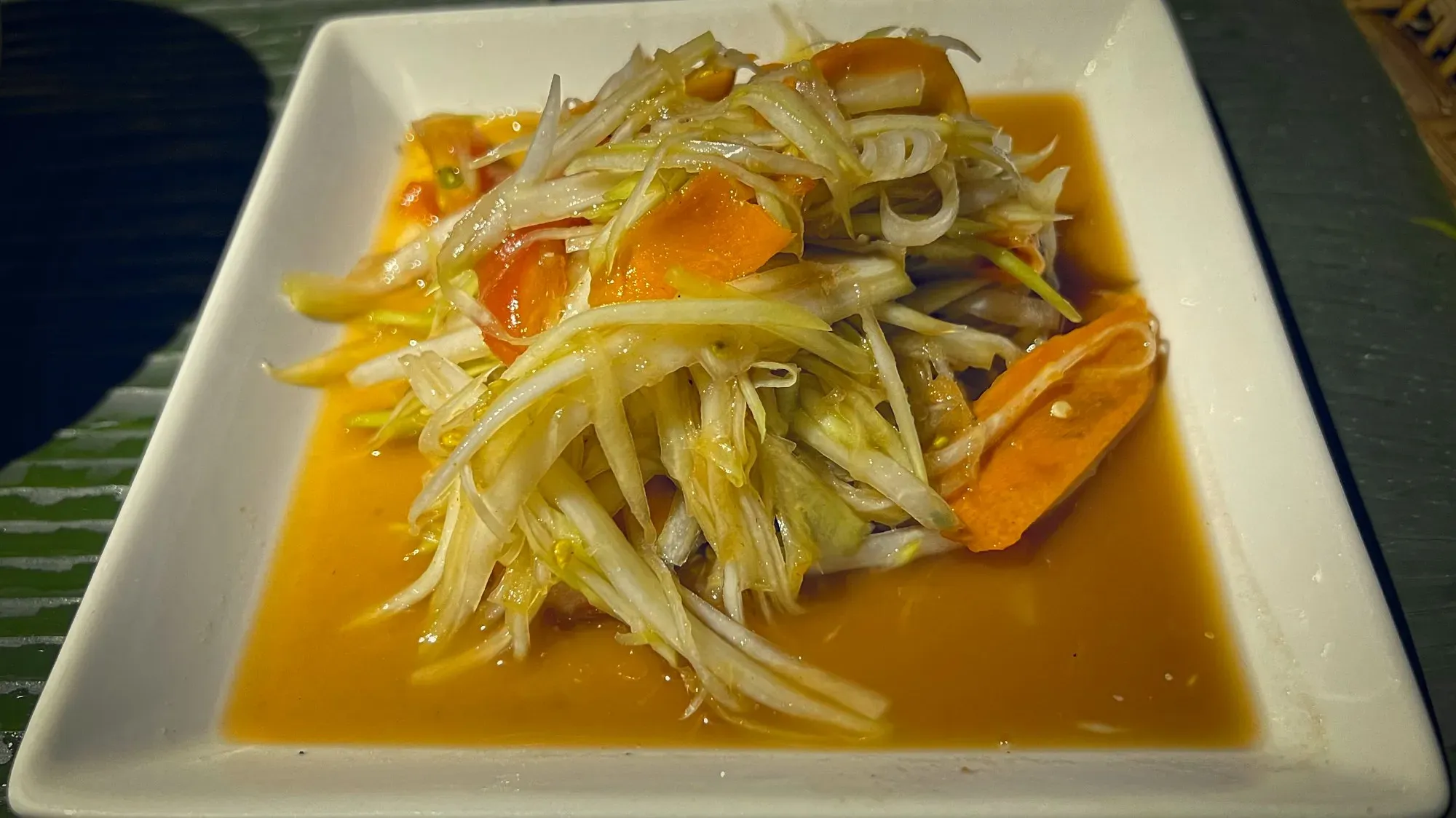 Tam Mak Hoong (Green Papaya Salad) dish.
