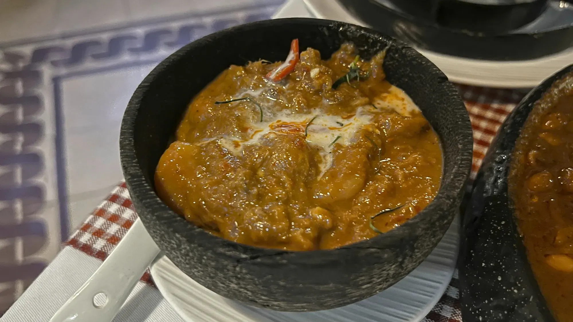 Prahok served in a bowl.