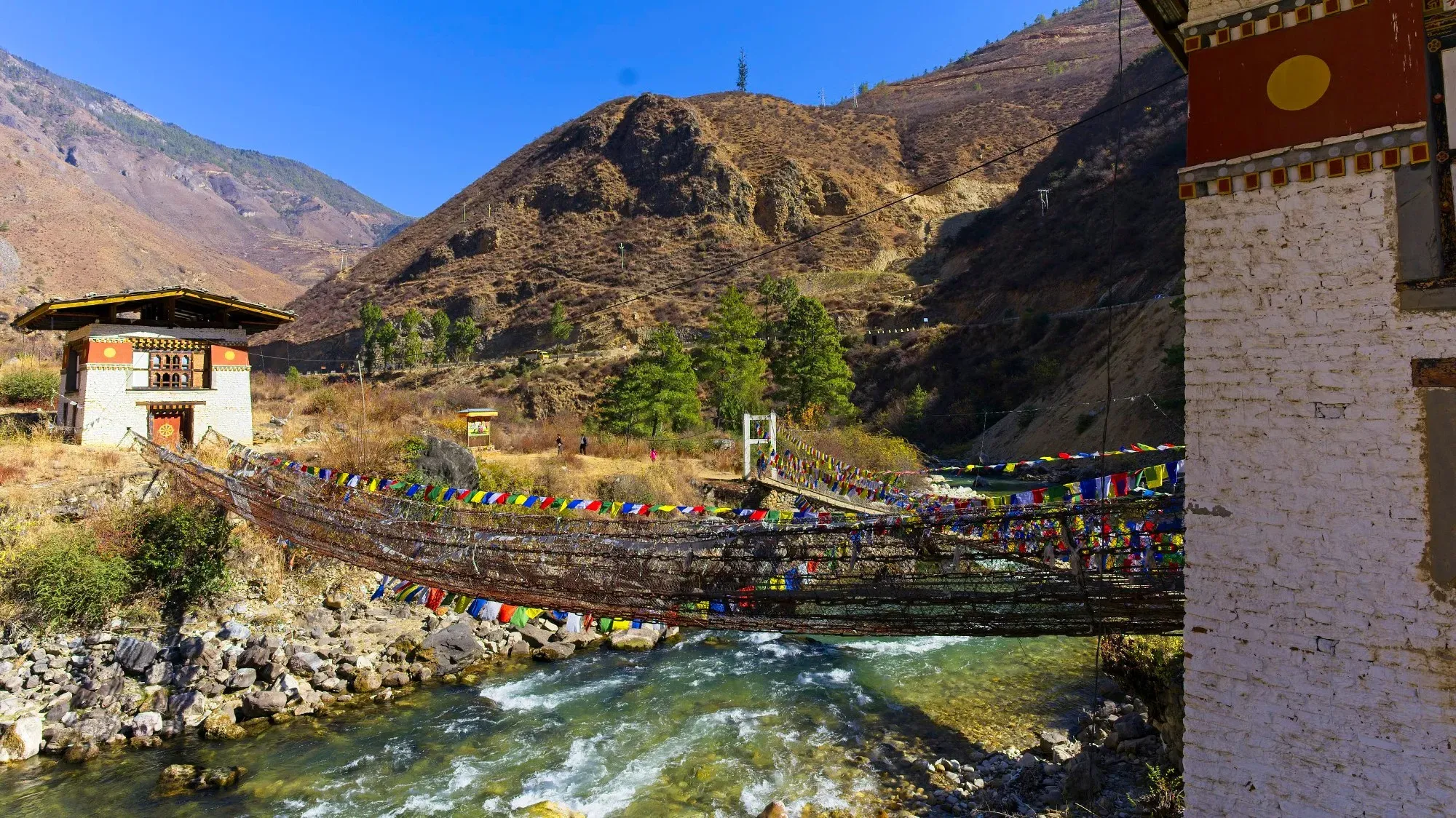 Chain bridge spanning a river