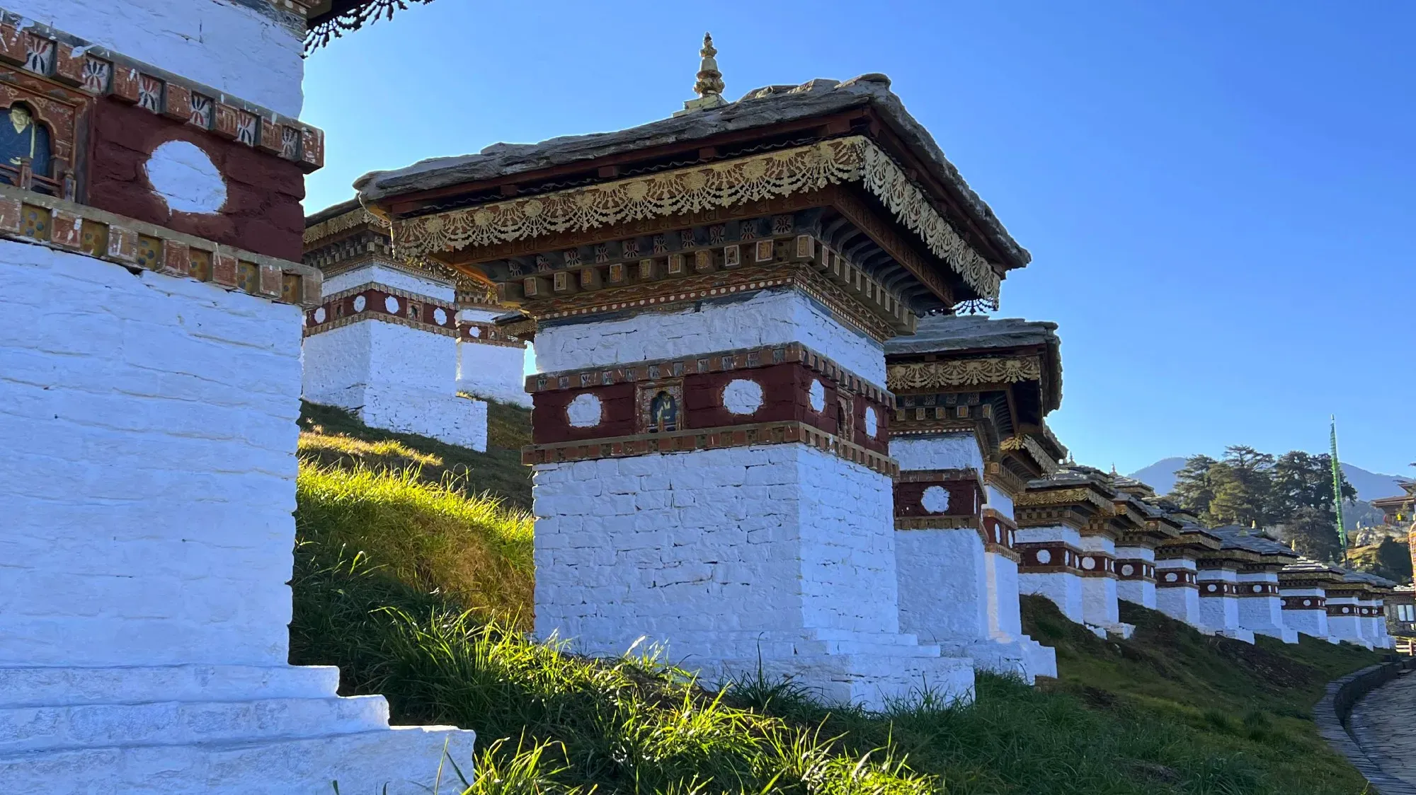 A series of white painted stupas