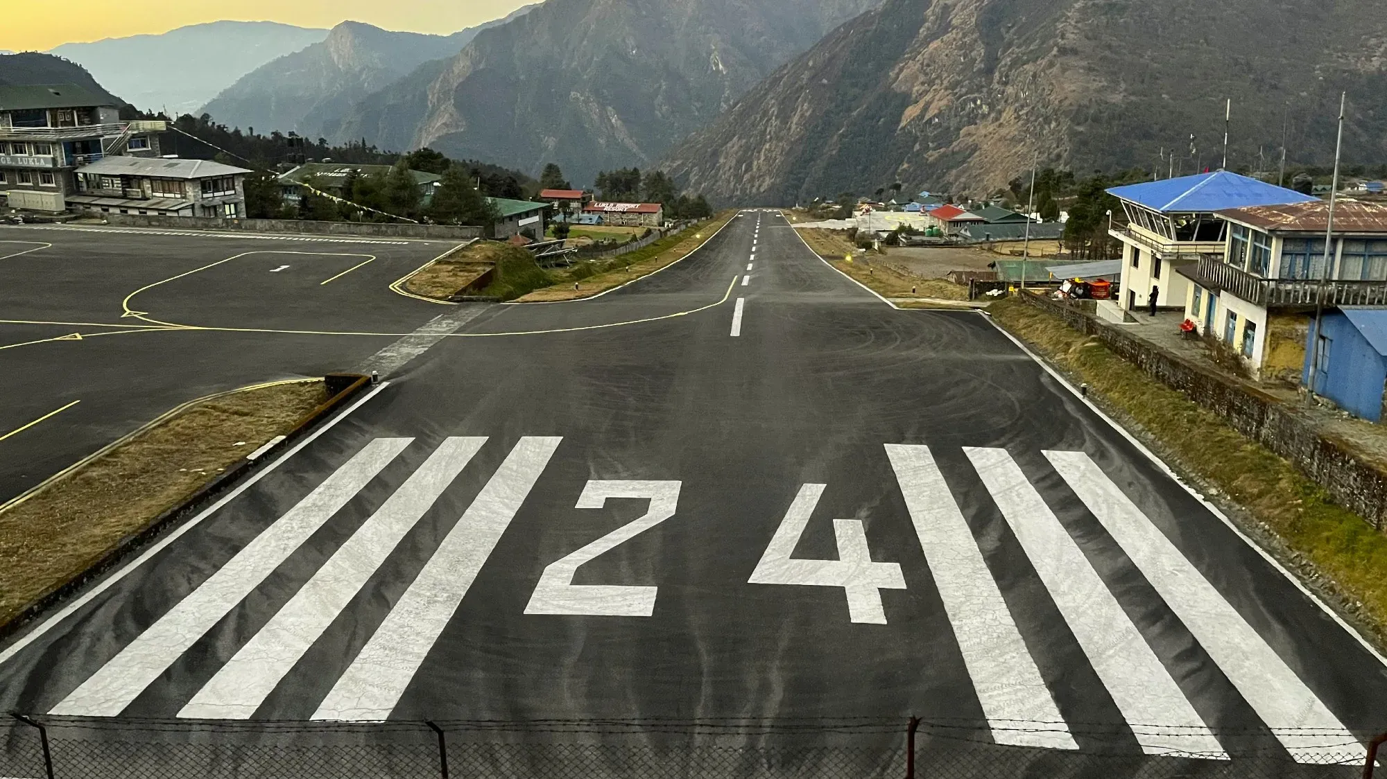 Looking down the Lukla Airport runway off into the valley