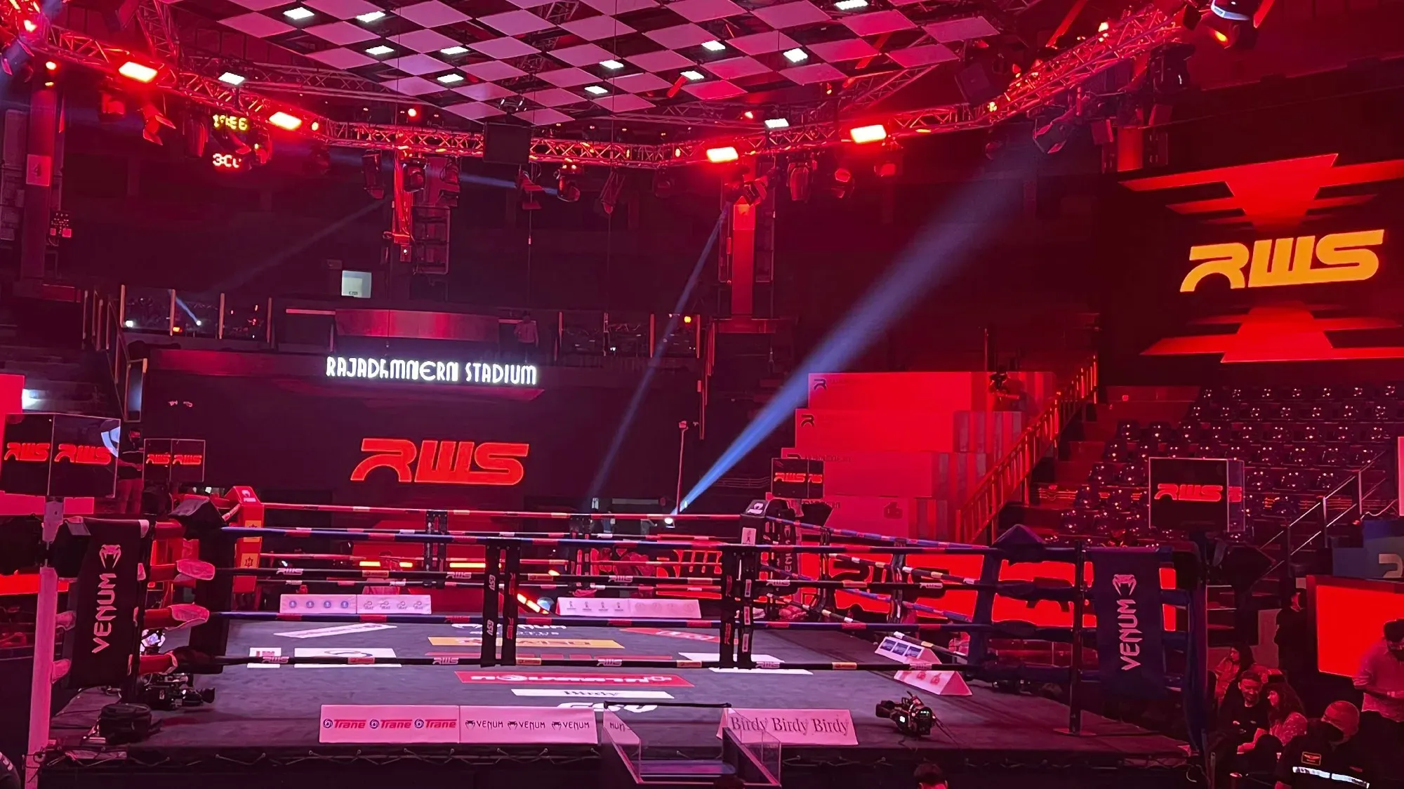 Fighting ring inside the stadium lit up with red lights