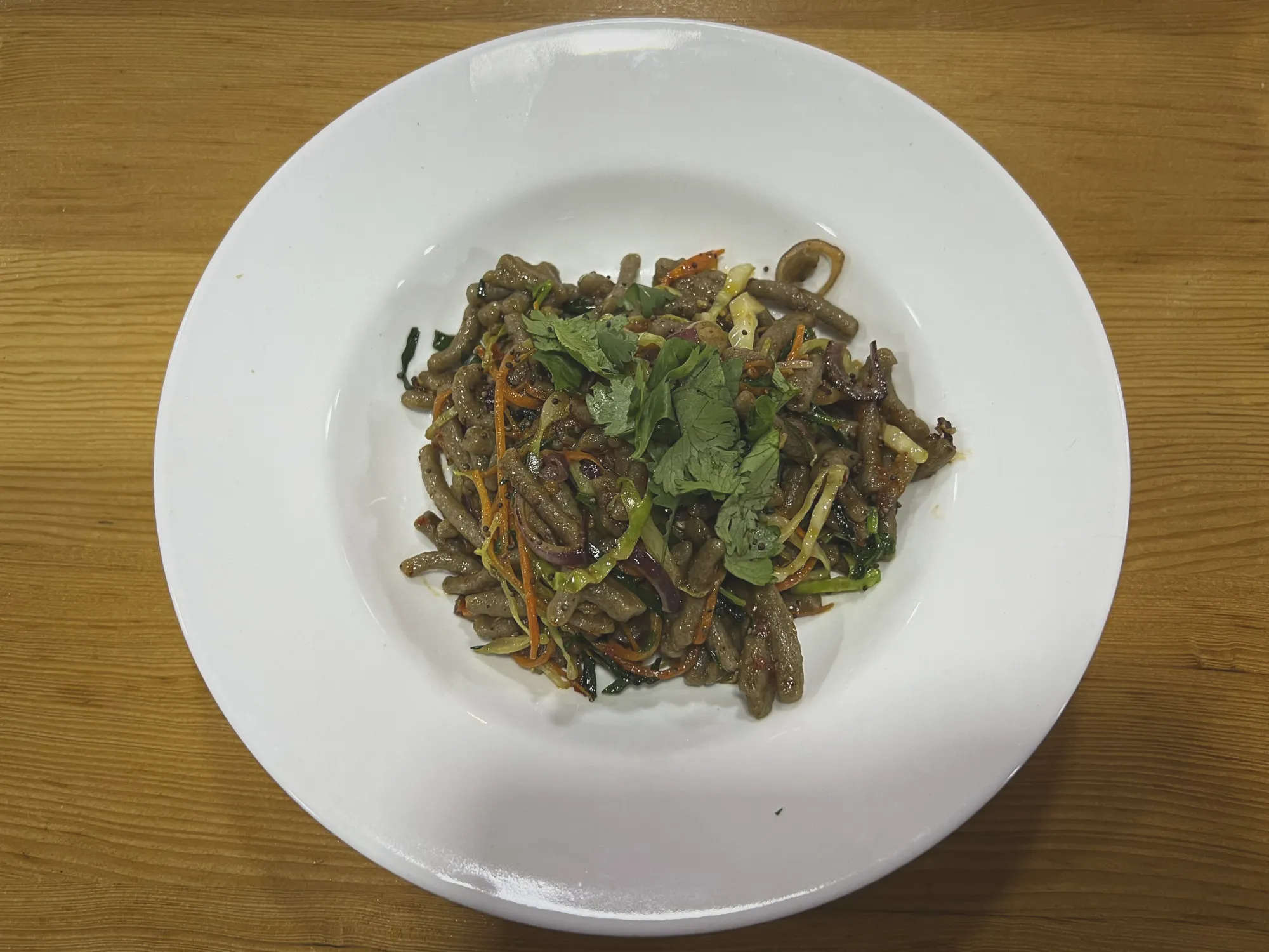 Bowl of Puta pasta dish, overhead shot.