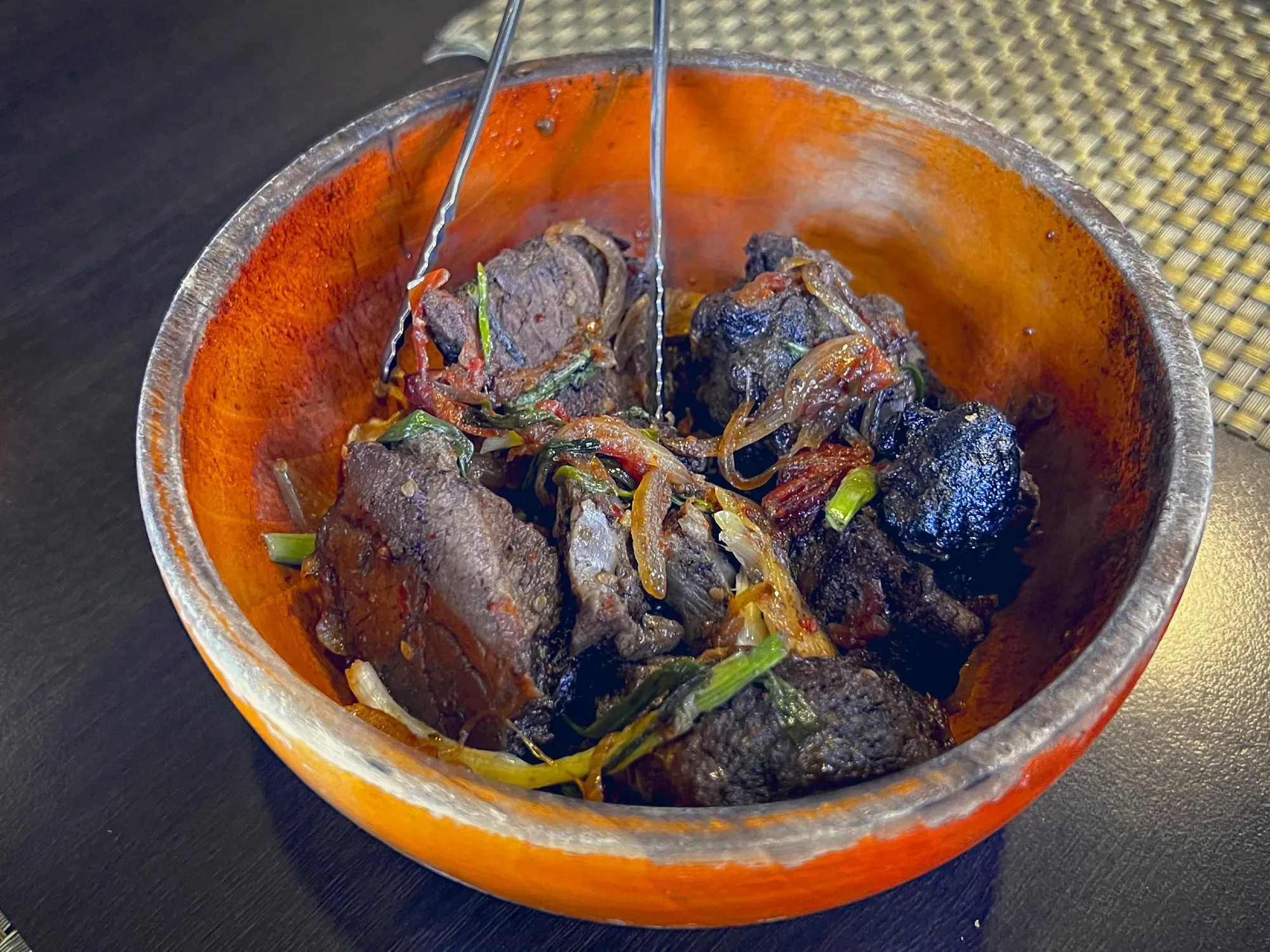 Yaksha Schaam in a wooden bowl, angled shot.