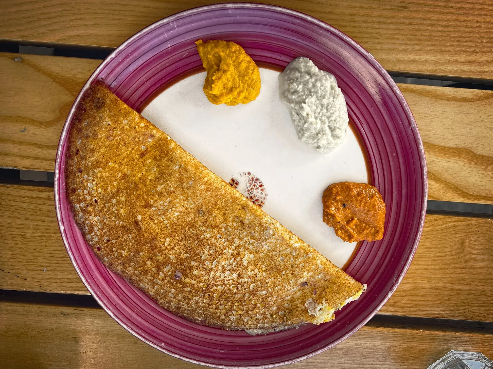 Overhead shot of Does with three scoops of different dips on a single plate.