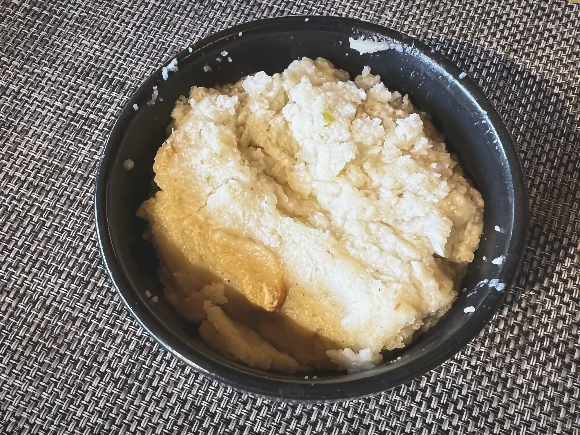 Close up shot of a small bowl of Upma.