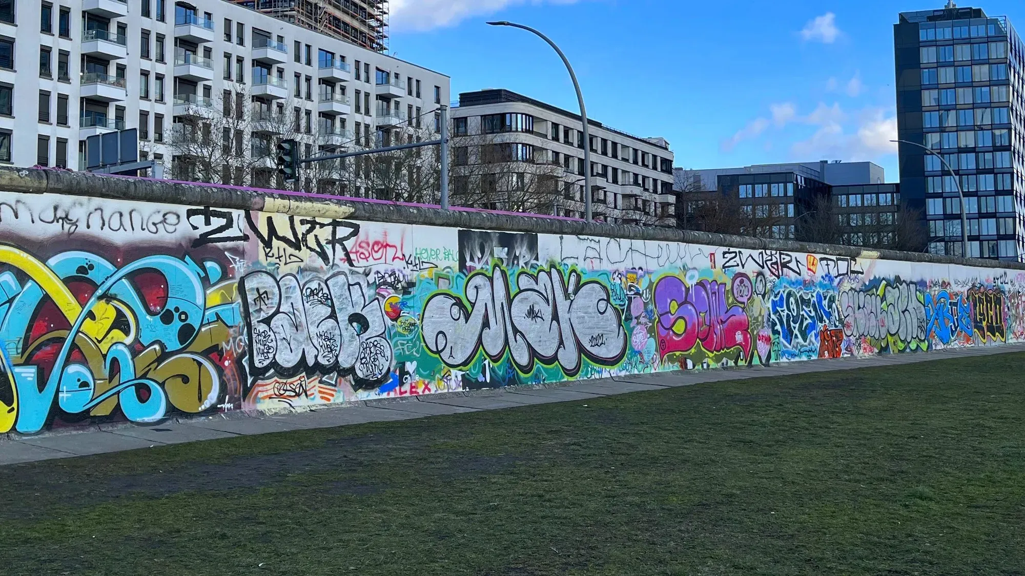 Stretch of the Berlin Wall covered in graffiti