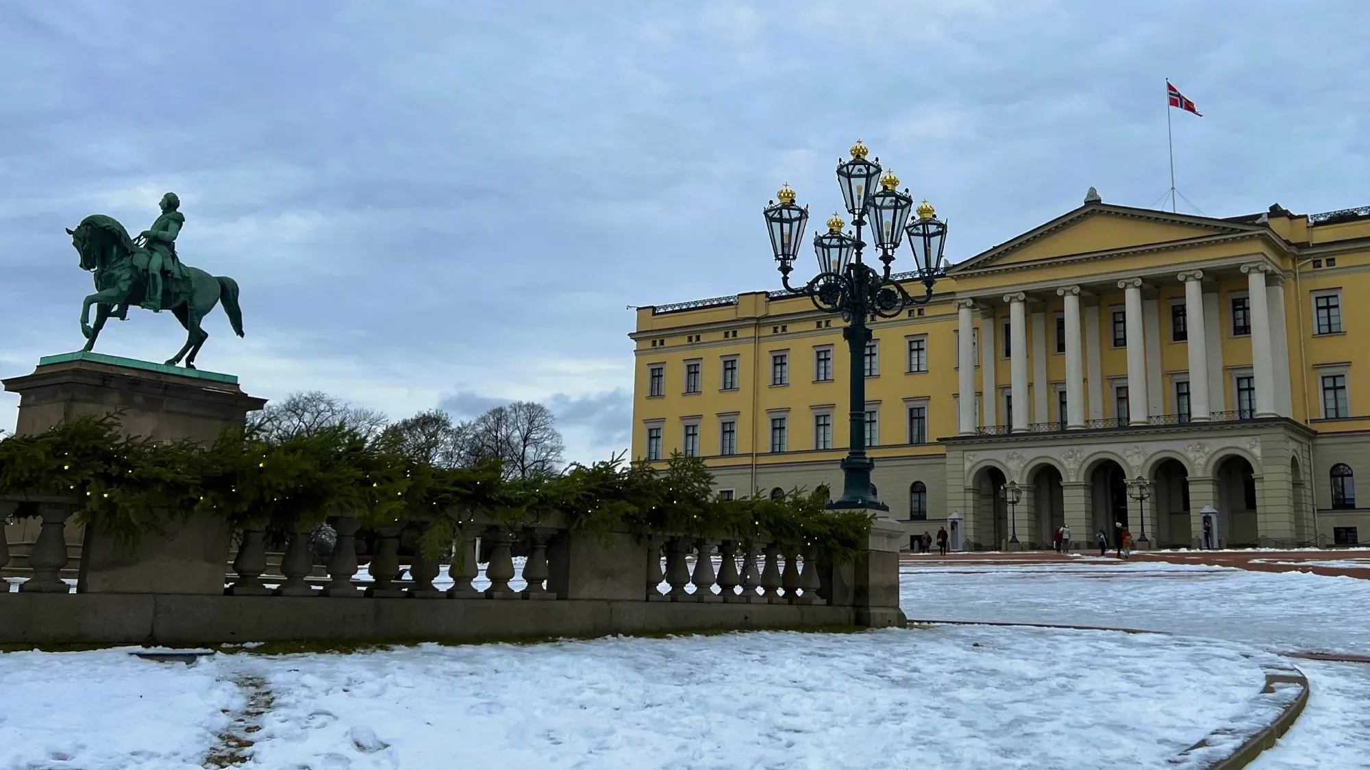 Yellow palace with snow on the ground