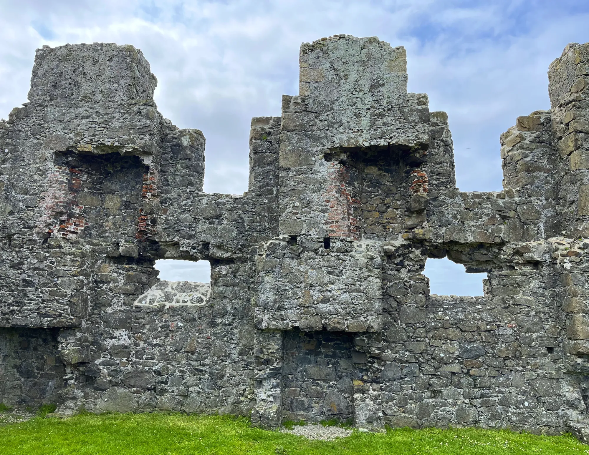 Remnants of a grey stone castle wall