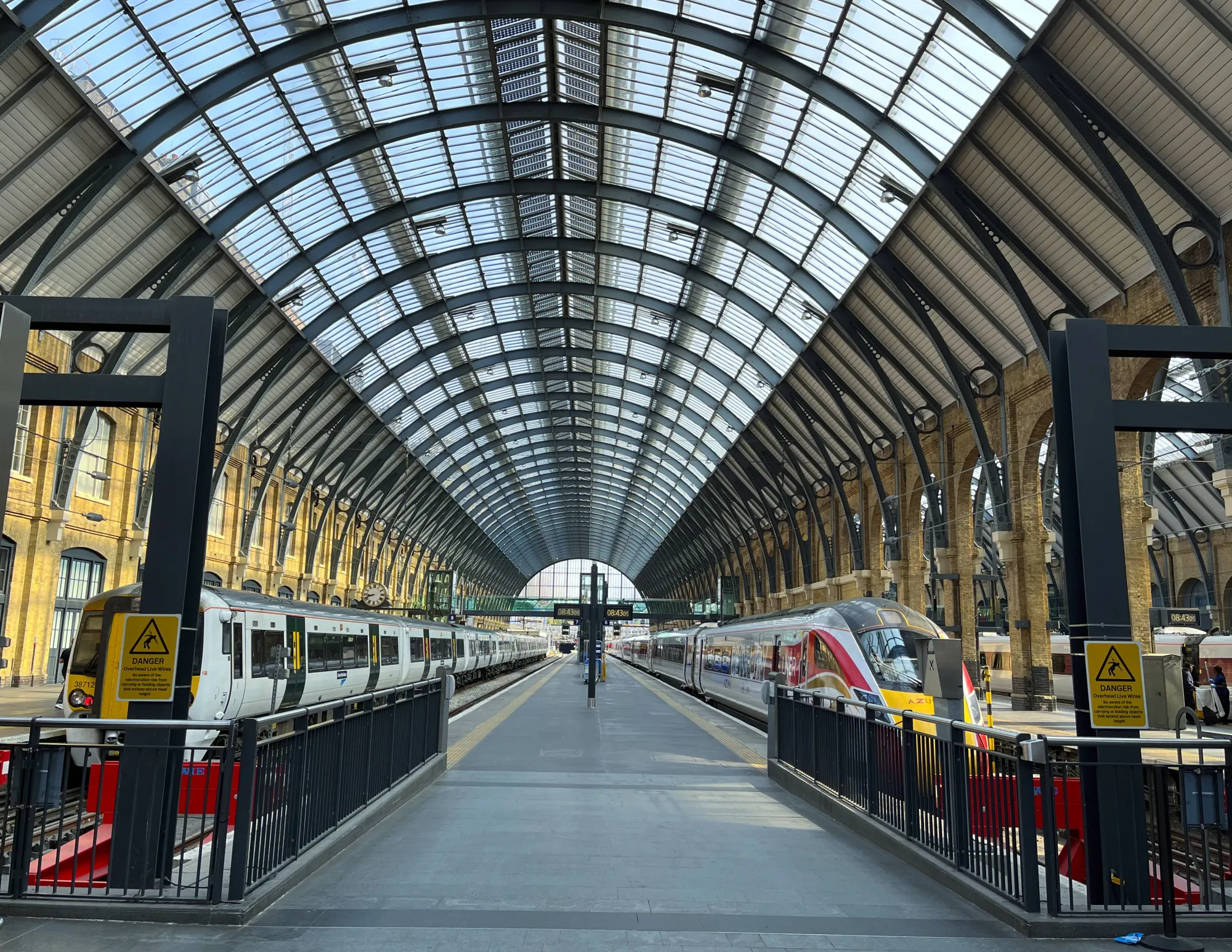 Two platforms with trains pulled up to the station