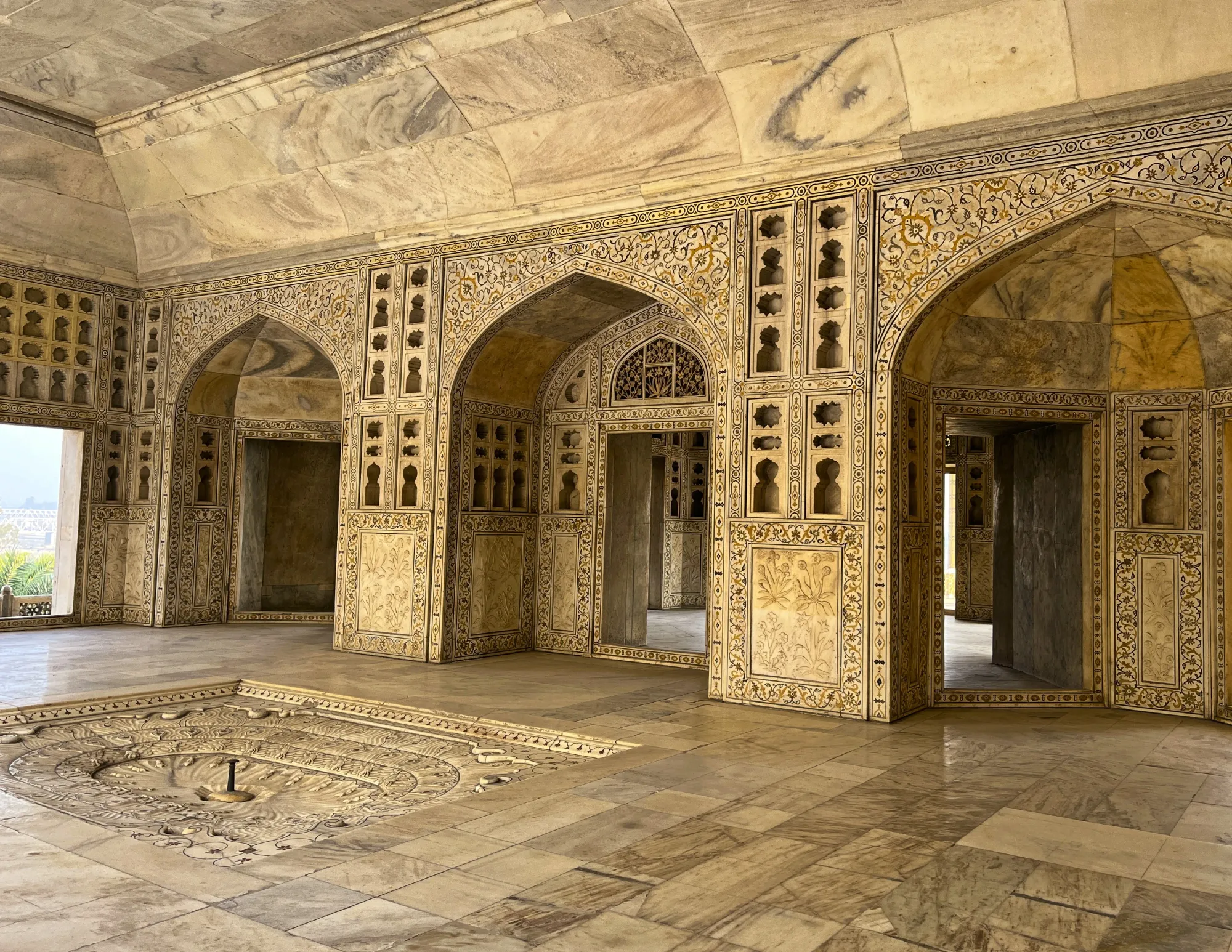 Carved mosaics with an inset on the floor