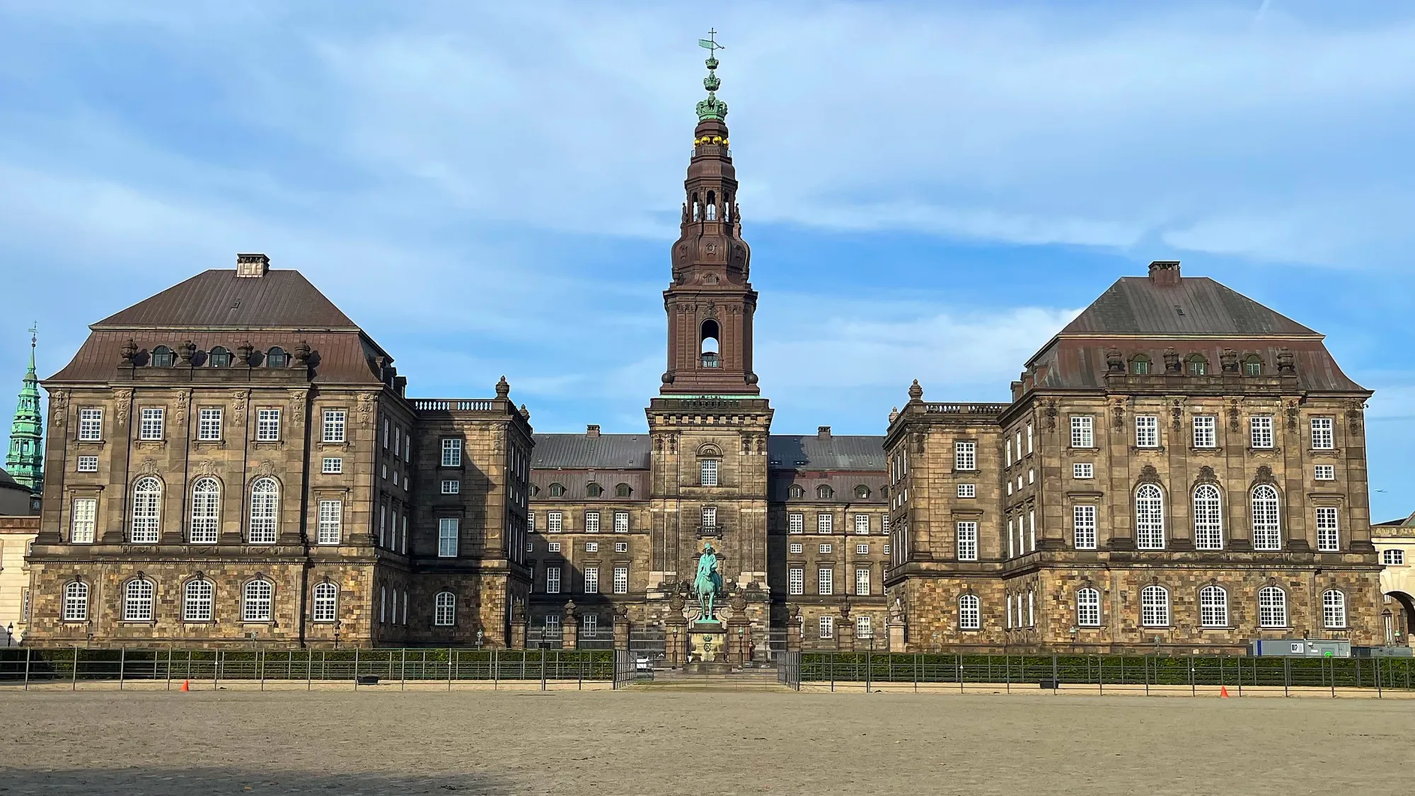 Brick governement building with copper statues