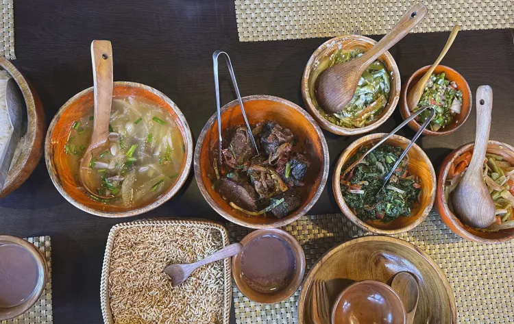 Overhead shot of traditional Bhutanese foods in wooden bowls.