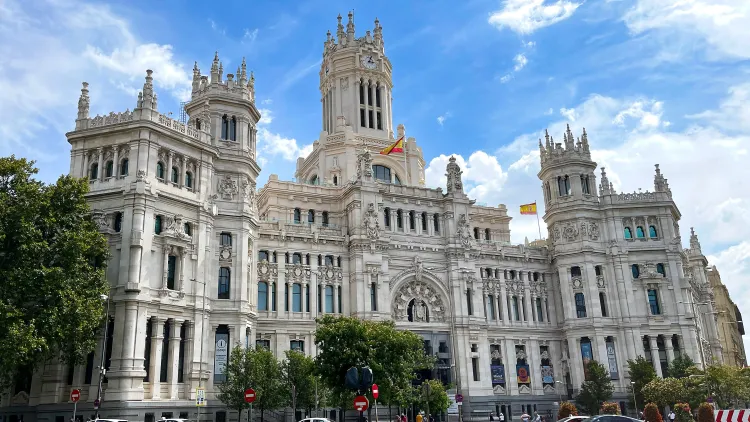 White multi-tiered palace with Spanish Flag on it