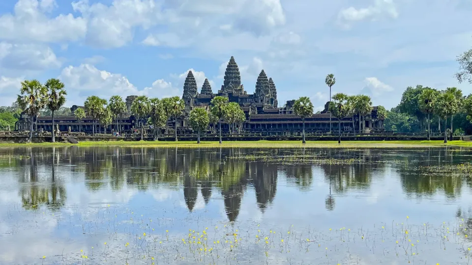 Landscape photo of the Angkor Wat temple with its reflection in water